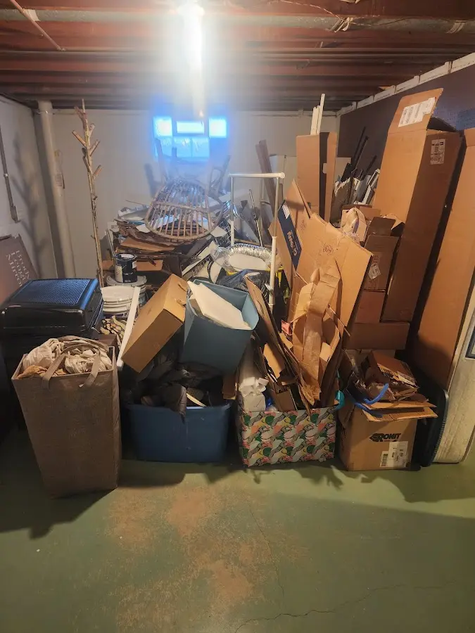 Roll-off dumpster container at job site for 6 Yard Dumpster Rental in Monfort Heights